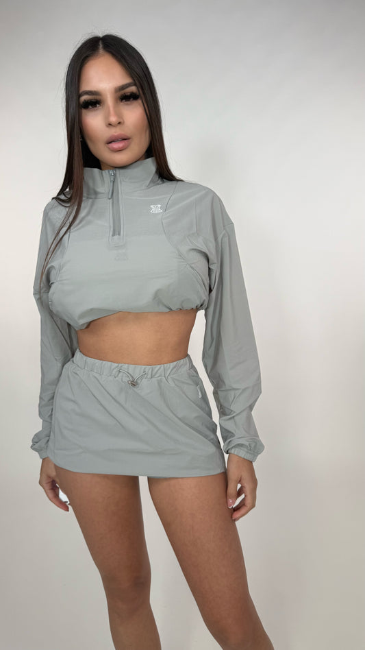 Set abrigo y falda impermeable